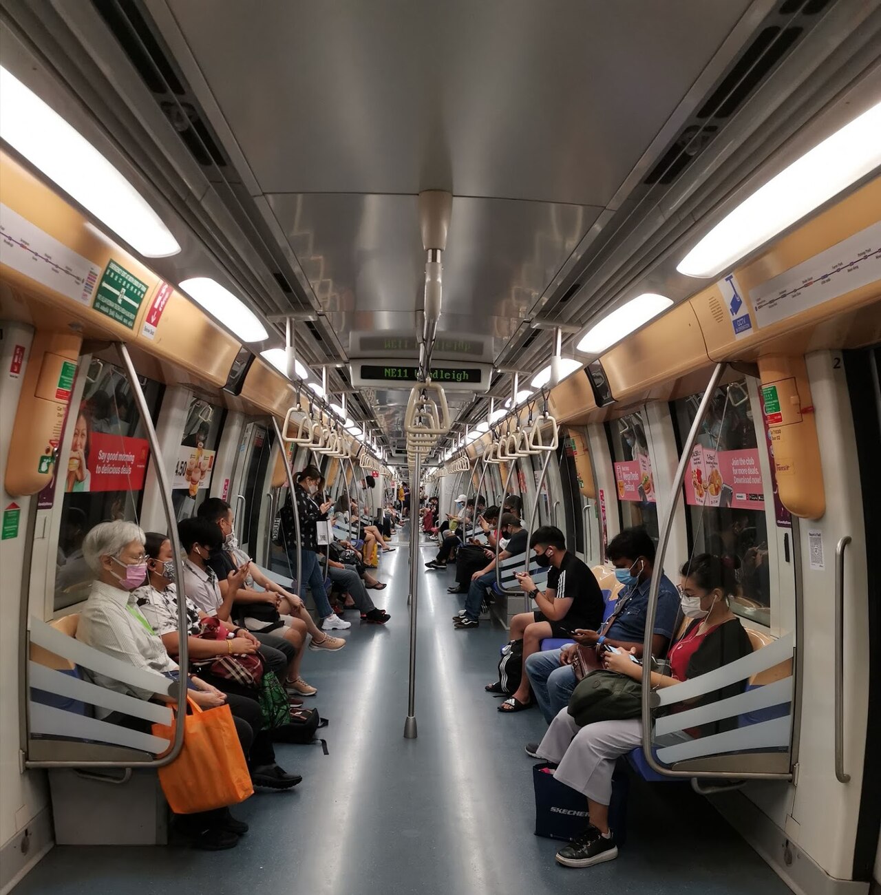 Passengers on a Singapore MRT train