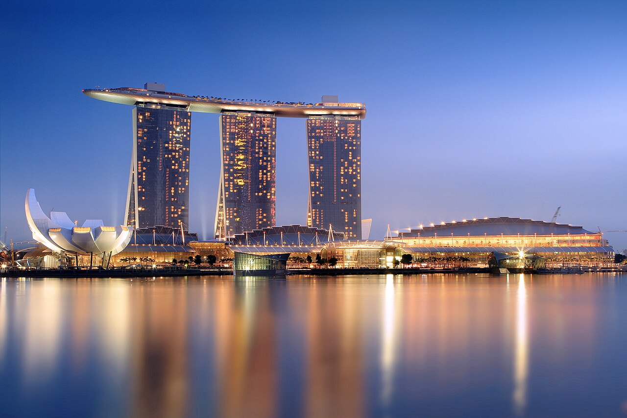 Marina Bay skyline with Marina Bay Sands and the business district at dusk